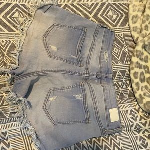 celebrity pink light ripped shorts.